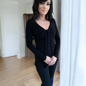 Black long sleeve top with a draping feature in the bust. Casual Top, Party Top, Long Sleeve Blouse, Fitted Top, Fitted Long Sleeve Top,