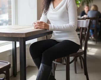 White ribbed cowl neck long-sleeve top.