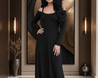 Vestido largo de manga larga con hombros descubiertos, poliéster y elastano negro.