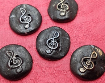 Set of 5 artisan buttons with multicolored treble clef pattern