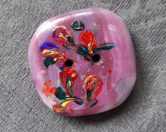 Colorful bursts on purple button, handmade for personalizing jackets, sweaters, etc.