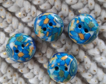 Small buttons shades of blue, handmade in polymer clay, makeover of layette clothes..set of 4.