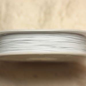 Bobina da 70 metri - Filo metallico bianco da 0,38 mm - 4558550018434