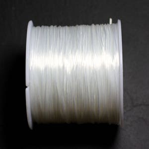 Reel 42 meters approximately - Flat Fiber Elastic Thread 0.8-1mm Transparent White - 7427039730501