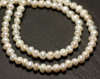 Strand 35cm 80pc approx - Cultured freshwater pearls Balls 4-5mm Iridescent white