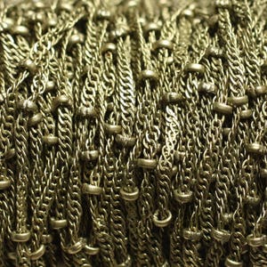 Spoel van ongeveer 100 meter - Ovale Schakelketting en Bronsbruine Metalen Kralen 2mm - 7427039735612