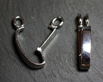 May include: Two silver-toned metal clasps for jewellery making. One clasp is a simple loop with a bar, the other is a rectangular shape with a hinged opening.
