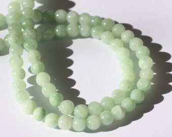 Fil 39cm 64pc env - Perles Pierre - Jade Boules 6mm Vert clair amande menthe Pastel