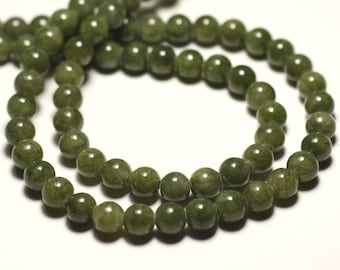 May include: A strand of dark green jade beads, strung together to form a necklace. The beads are round and smooth, with a subtle sheen.