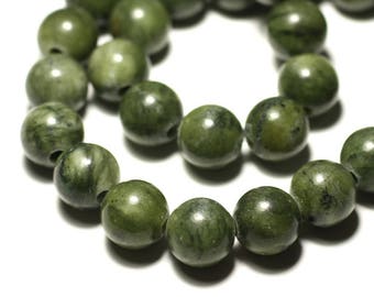 May include: A strand of dark green jade beads, each bead is round and has a smooth, polished surface.