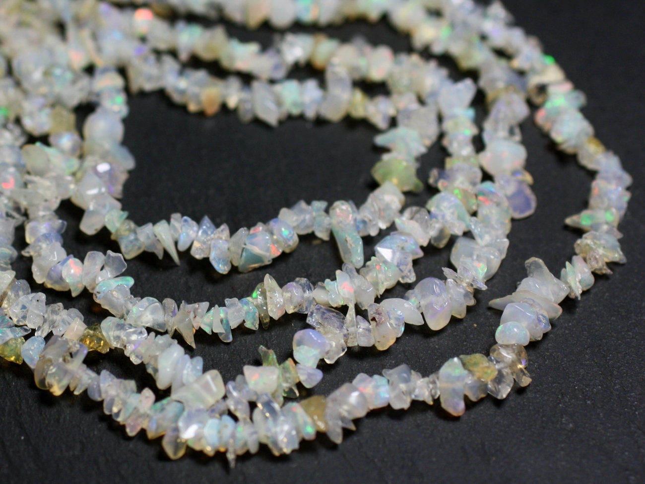 Opale Blanche Multicolore D'Éthiopie Naturelle - 8x6 Mm - 0,95 Carats - Neuf