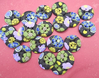 Black sewing buttons with 2-dimensional flowers; 2.5 cm and 1.5 cm, in polymer clay