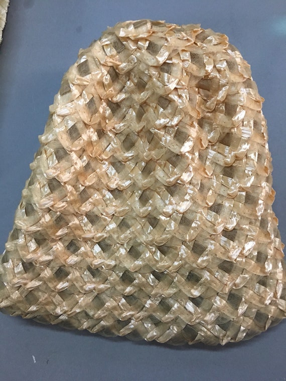 Handwoven raffia hood