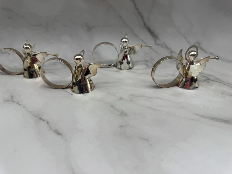 May include: A rustic wooden sign with the text "Welcome to our home" in white lettering. The sign features a distressed finish and a simple, inviting design, perfect for a front porch or entryway.