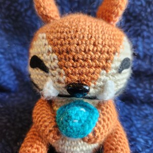 Palia inspired Chapaa crocheted plushie. Pumpkin.