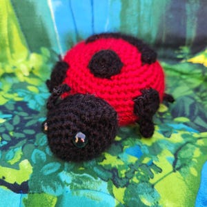 Palia inspired Garden Ladybug crocheted plushie.