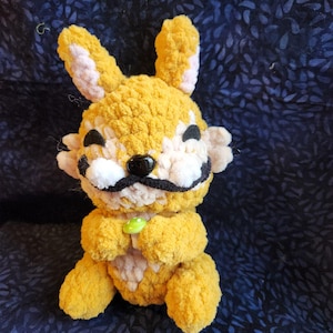 Fuzzy Palia inspired Chapaa crocheted plushie.