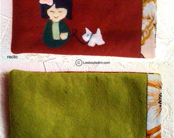 Lens case with lined fabric with appliqué.