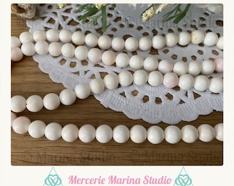 Lot de perles en nacre blanche rosé 6mm - véritable coquillage---Minimum de commande 5 euros hors frais d'envois