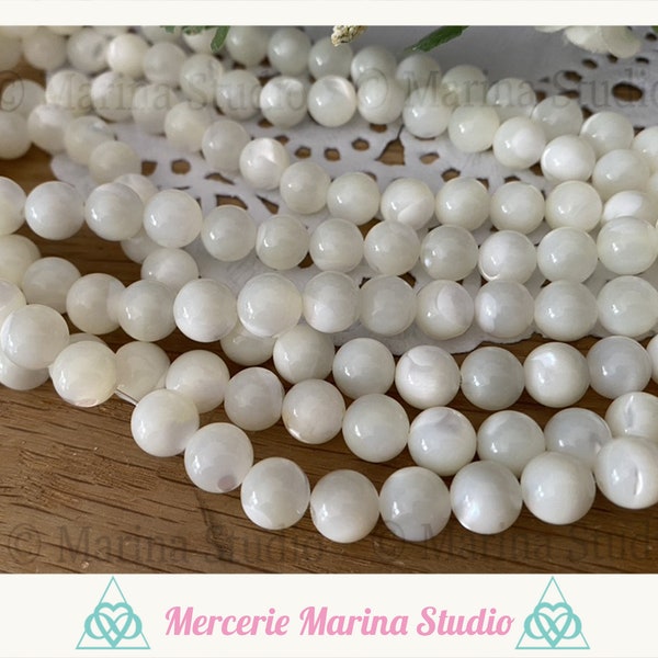 Lot de 10  perles en nacre blanche avec nacre 8mm ou 6mm---Minimum de commande 5 euros hors frais d'envois