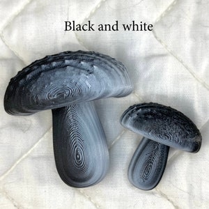 3d-printed Mushroom magnets in 2 sizes Black and white
