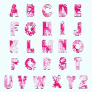 May include: Pink tie-dye alphabet letters A through Z. Each letter is outlined in white.