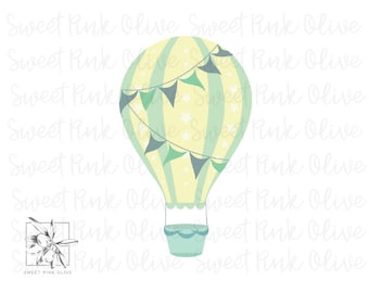 May include: A light green and yellow hot air balloon with white stars and a string of green and blue flags. The balloon has a light blue basket.