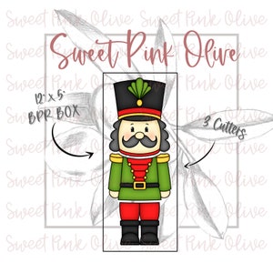 May include: A digital illustration of a nutcracker with a green uniform, red sash, and black boots. The image is labeled "Sweet Pink Olive" and "3 Cutters".