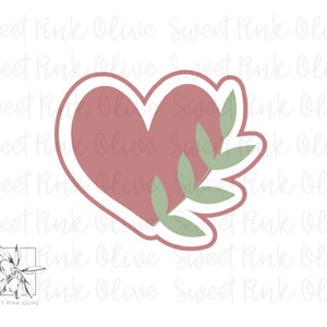 May include: A pink heart with a green leafy branch design. The heart is outlined in white.