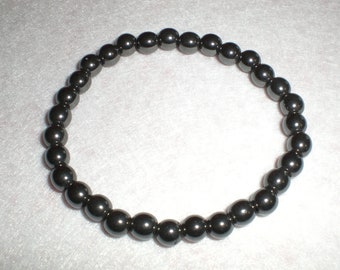 Bracelet  HEMATITE METALLIQUE en perles naturelles , 6 mm sur élastique