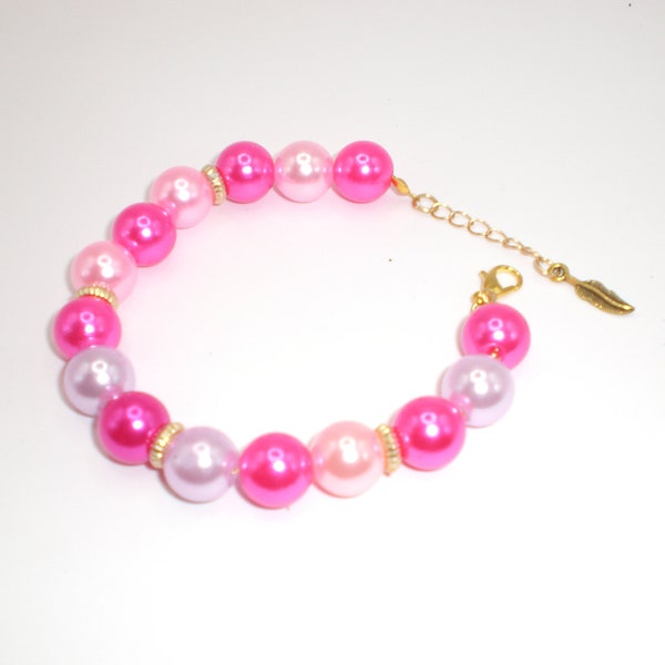 Superbe bracelet en perles roses 12 mm