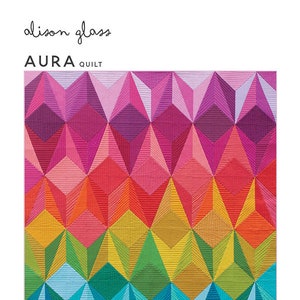 May include: A colorful quilt with a geometric design. The quilt features a repeating pattern of three-dimensional diamond shapes in a gradient of colors, including pink, red, orange, yellow, green, blue, and purple. The quilt measures 48" x 60".