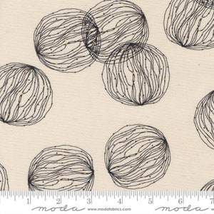May include: A beige fabric with a repeating pattern of black and gold circles. The circles are made up of thin lines that create a web-like design. The fabric is perfect for quilting, sewing, and crafting.