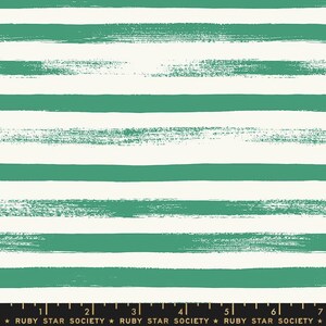 May include: Seafoam green and white striped fabric with a brushstroke pattern. The fabric is marked with a ruler and the text "RUBY STAR SOCIETY".
