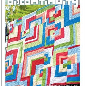 May include: A colorful quilt pattern called "Discontinuity" by Carolina Patchworks. The quilt is made in a variety of colors, including red, blue, green, and white. The quilt is made in five sizes, from crib to king.