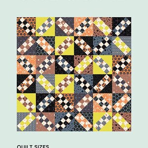 May include: A patchwork quilt with a geometric design in shades of black, orange, yellow, and brown. The quilt features the text "FIVE & DIME" at the top and "patch + dot" at the bottom. Available sizes are 40" x 40" Baby and 60" x 60" Throw.