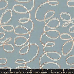 May include: A blue fabric with a white and copper colored abstract pattern of overlapping loops and swirls.