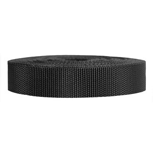 May include: A roll of black nylon webbing, a type of strong, durable fabric often used for straps, belts, and other applications.