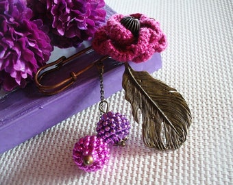 Broche bronze, rose et violette