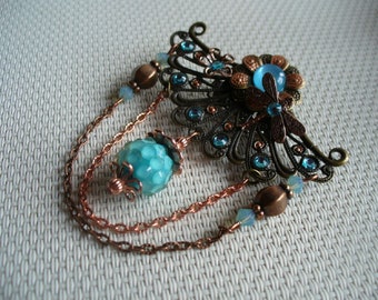 Broche romantique d'nspiration baroque bronze et bleue turquoise