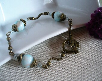 Bracelet romantique bronze et bleu ciel