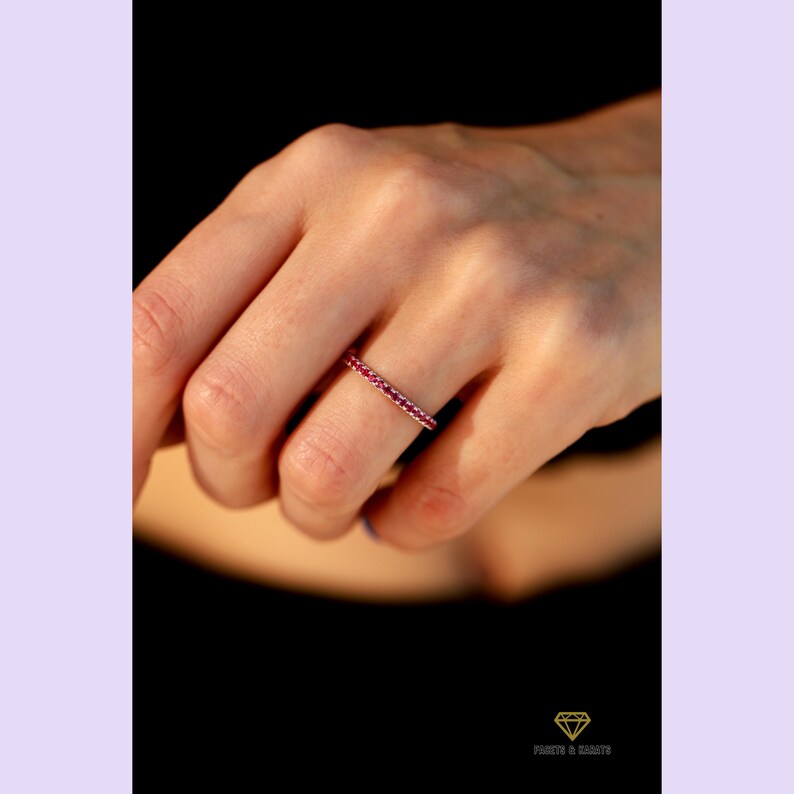 Half eternity ruby wedding band for women with 1.5mm stones made in platinum