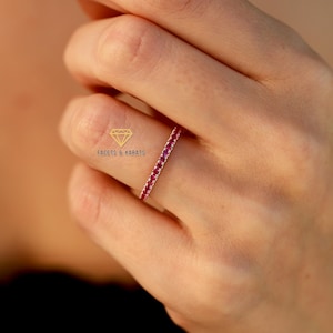Half eternity ruby wedding band for women with 1.5mm stones made in platinum