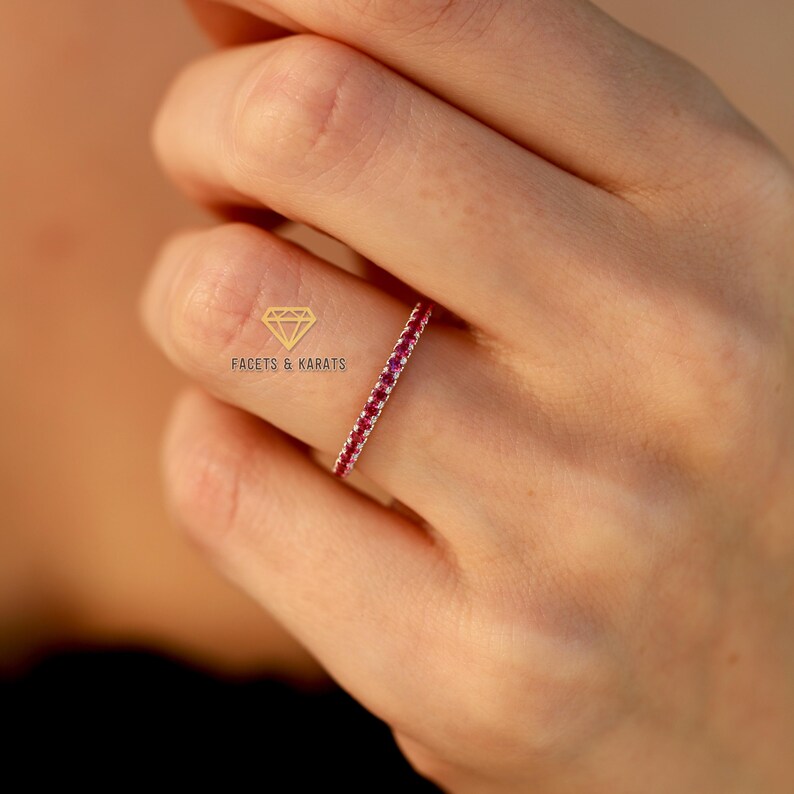 Half eternity ruby wedding band for women with 1.5mm stones made in platinum