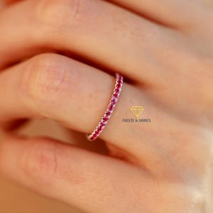 Half eternity ruby wedding band for women with 1.5mm stones made in platinum