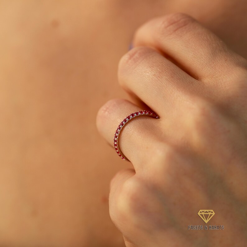 Half eternity ruby wedding band for women with 1.5mm stones made in platinum