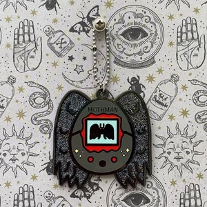 Mothman Tomagotchi Pet Enamel Pin and Keychain
