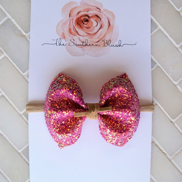 Raspberry Glitter baby bow headband or baby clip with non shed glitter fabric and suede tie