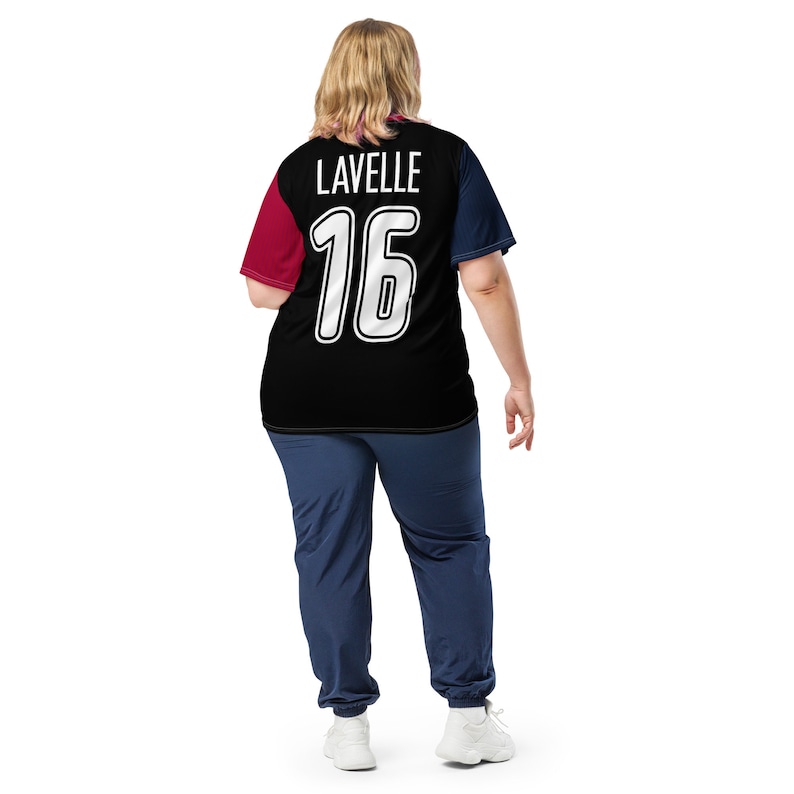 May include: Black jersey with red and blue accents. The back of the jersey has the name "LAVELLE" and the number "16" in white.