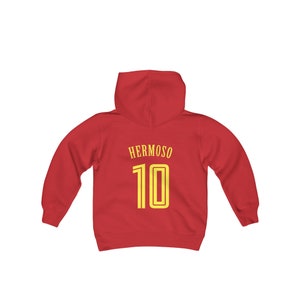 May include: Red youth-sized hoodie with a yellow  "HERMOSO 10" graphic on the back.